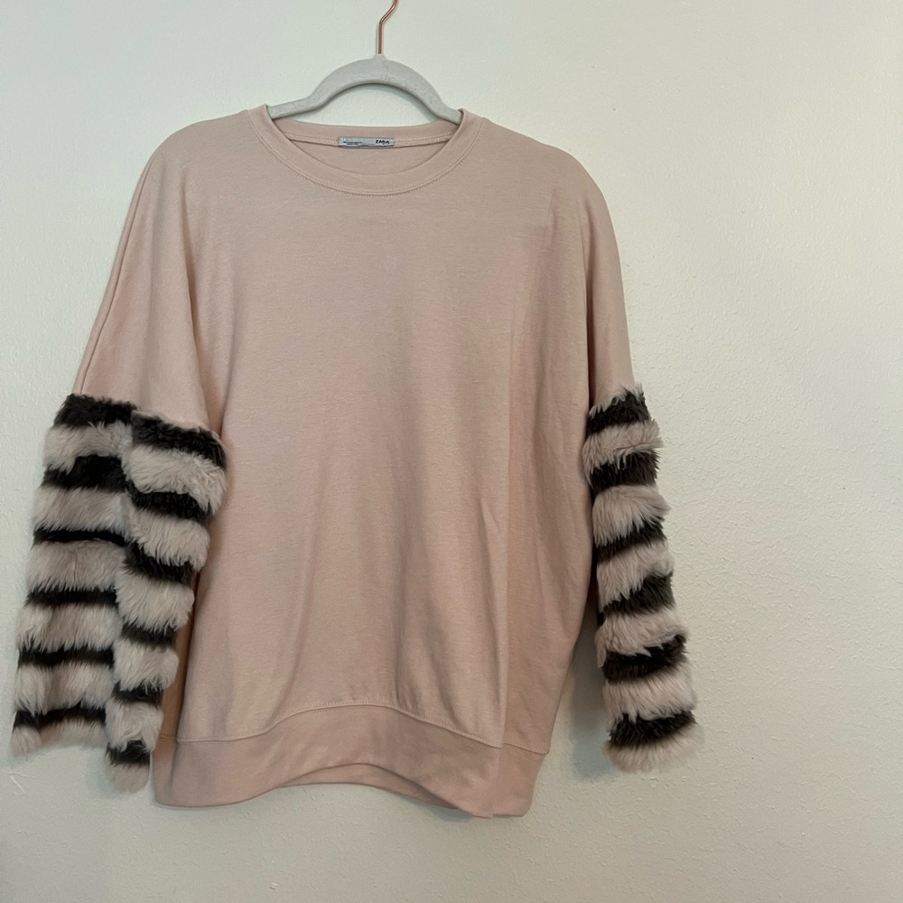 - Zara light pink sweatshirt with fluffy sleeves